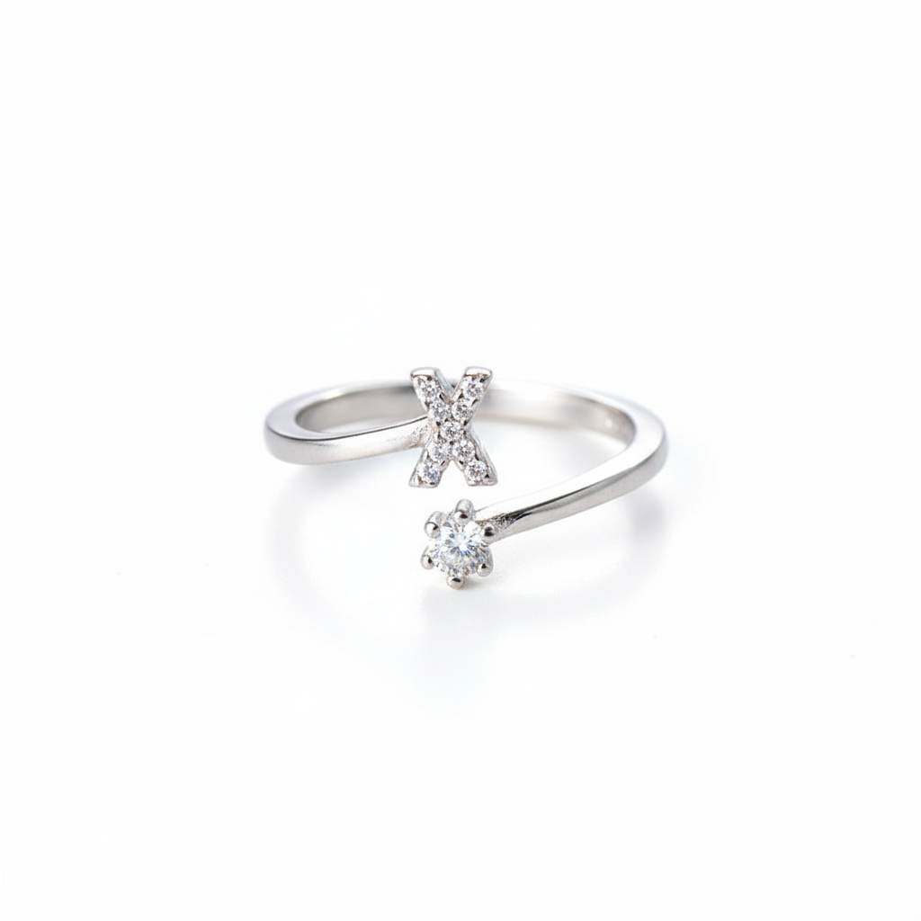 anel letra cravejada