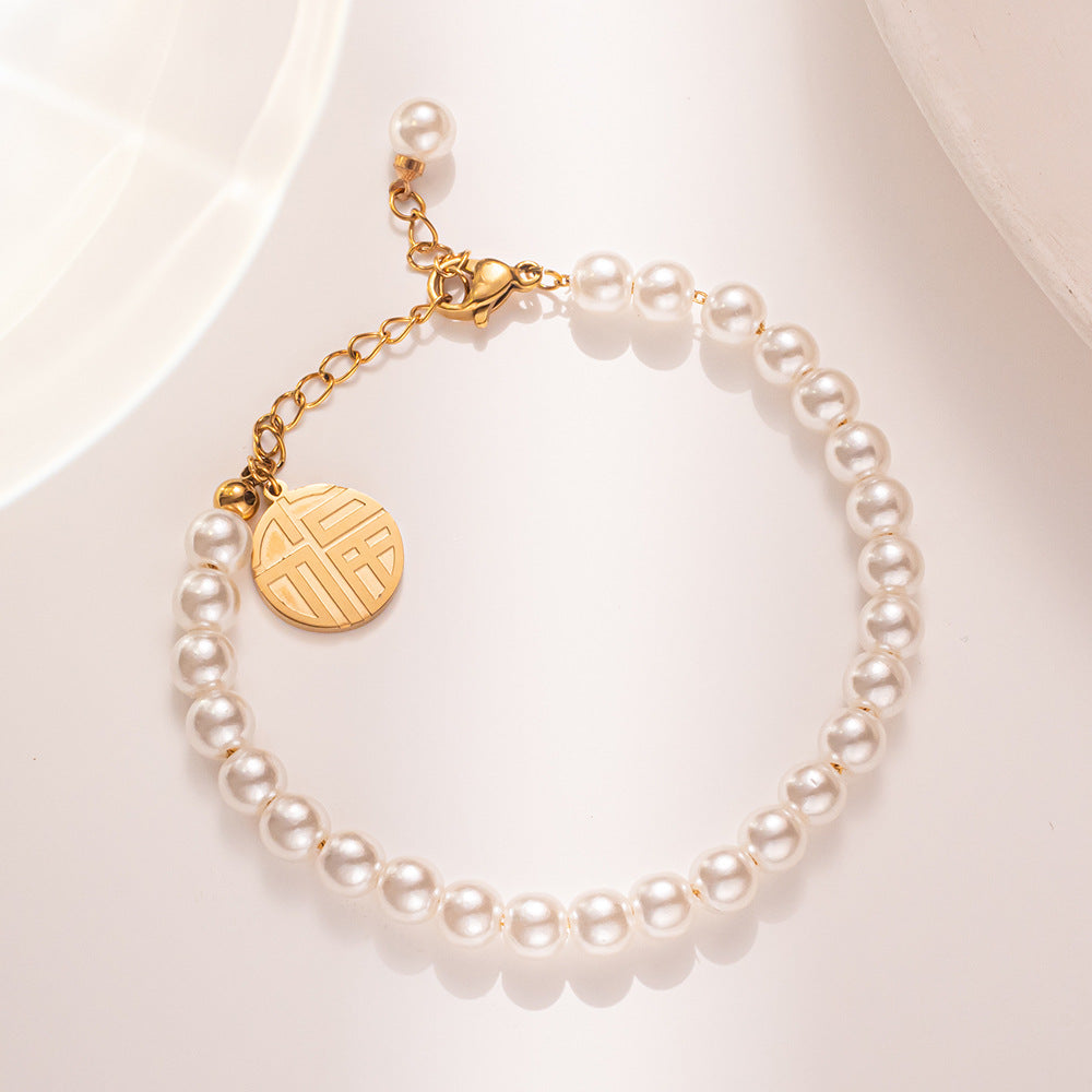 pulseira talismã de pérolas