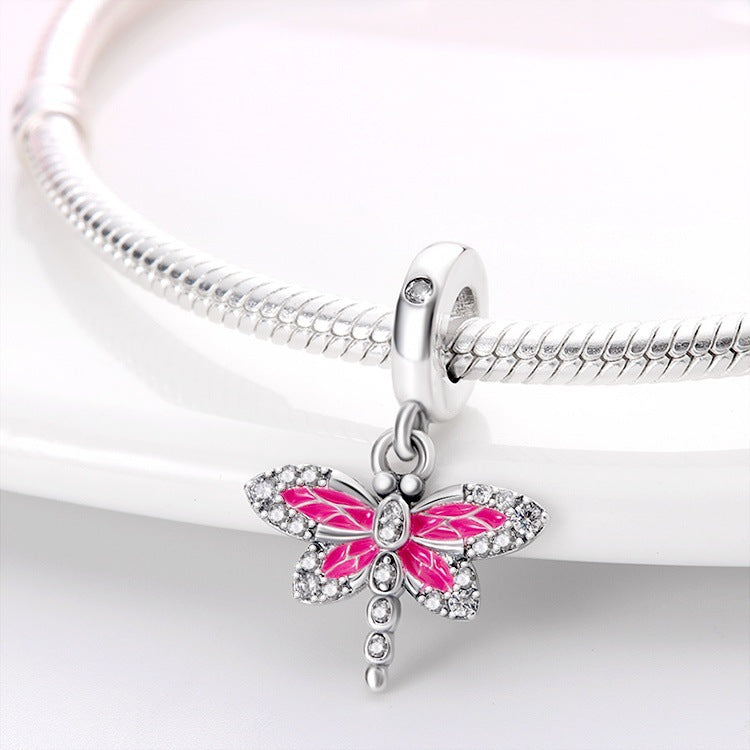 berloque libélula rosa cravejada