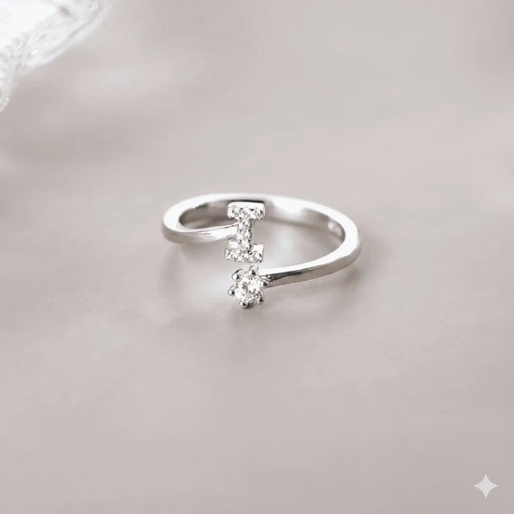 anel letra cravejada